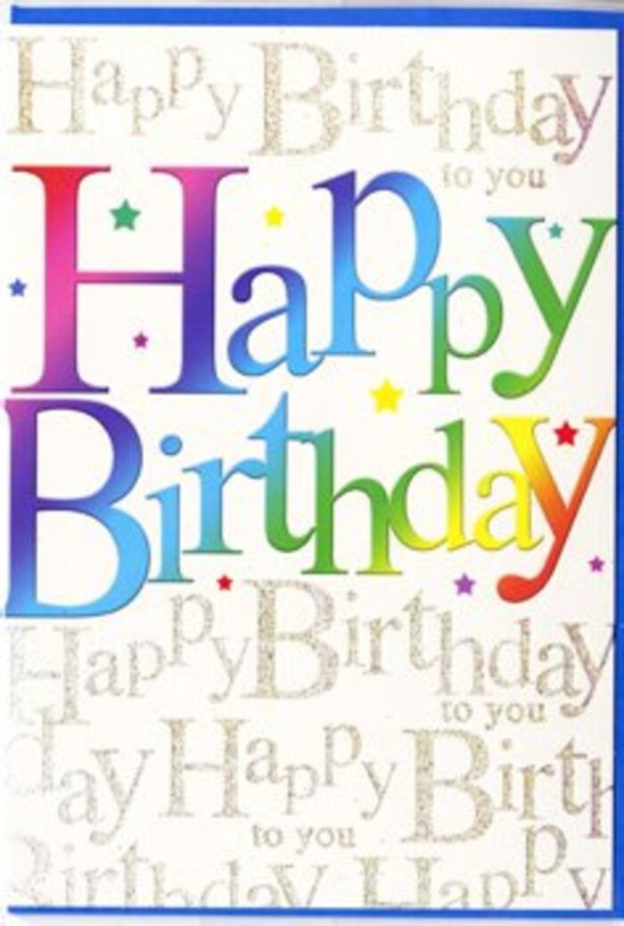 In this image, a contemporary birthday card stands upright, its design radiating the same sense of occasion as a birthday brunch in a favourite Brentwood café. The card's focal point is the phrase Happy Birthday, displayed in generous, rounded letters that arc lightly across the front. Each letter is filled with a rich gradient of colour, transitioning smoothly from one hue to the next: intense scarlet melts into fuchsia, which deepens into plum and velvety purple, then shifts into clear blue, aquamarine, and fresh green before warming into bright yellow and soft orange. These colour passages feel as harmoniously blended as the tones in a well-chosen birthday bouquet ready for delivery near Ingrave or Herongate. The printed letters appear sleek and smooth, with a hint of gloss that suggests a tactile softness, almost like running a finger along a satin ribbon. Behind this joyful headline, the background is an intricate field of tiny cursive writing, all in shimmering gold. The repeating message Happy Birthday to you forms a continuous pattern, the loops and swirls of each word interlacing in a gentle, rhythmic flow. Under direct light, these golden lines sparkle subtly, as if dusted with the faintest layer of glitter, evoking the glint of sun on wet pavements after a light shower over Brentwood. Around the main text, tiny colourful specks are scattered sparingly, introducing a hint of confetti-like energy without distracting from the typography. No illustrations of balloons, candles, or cakes are present; the beauty lies entirely in the combination of vivid colour and delicate metallic script. It is easy to imagine this card being chosen thoughtfully at Flowers Brentwood, then nestled among fragrant blooms destined for a milestone birthday celebration in central CM14.