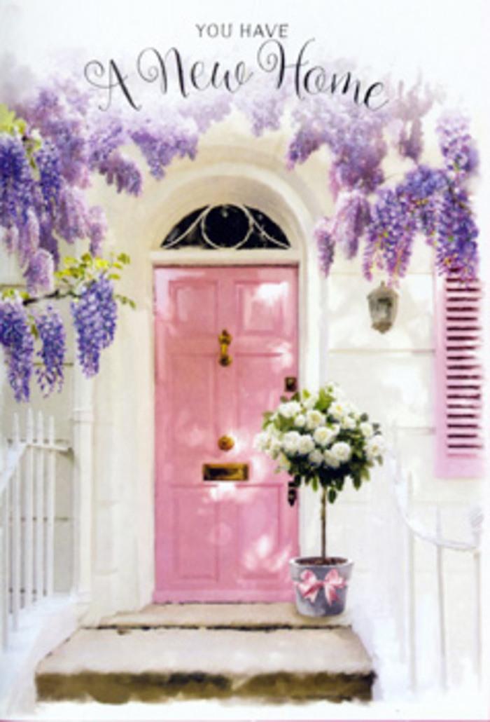 This doorway scene, reminiscent of a hidden gem along a residential lane near Brentwood High Street, captures the tender emotions of moving into a new home. The focal point is a softly painted pink front door, its gentle hue both playful and reassuring, like a warm smile for every visitor who crosses the threshold. Sunlight falls across the door, accentuating its panels and giving it a subtle, inviting glow. Encircling the entrance, wisteria tumbles from above in lush, cascading streams of lavender blossoms, each cluster appearing almost feathery as it hangs against the wall. The surrounding whitewashed masonry and a simple shutter painted in a soft, muted tone create a serene backdrop, allowing the pastel colours to shine without distraction. At the doorstep, a grey tin bucket serves as a rustic yet stylish container for a florist-crafted bouquet. It overflows with creamy white roses, their petals dense, velvety, and gently curving outwards in perfect spirals. Interwoven among the roses are sprigs of fresh green foliage, adding texture, structure, and a hint of woodland charm, like the greenery you might see around local parks such as King George's. A delicate pink ribbon is tied carefully around the bucket, its satin bow echoing the hue of the door and bringing a deliberate elegance to the arrangement. The entire composition feels like a quiet celebration of new beginnings in Brentwood-soft, hopeful, and deeply personal. You can almost imagine the scent of the wisteria and roses mingling in the air, greeting anyone who steps up to this threshold with a message of congratulations, comfort, and the promise of many happy days to come.
