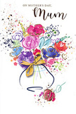 This Mother's Day card is painted like a breath of spring - a watercolour bouquet that seems to hum with colour and tenderness. Broad, wet brushstrokes form cerise and hot pink blossoms that sit beside cool indigo outlines and soft washes of lavender-blue, while hints of apricot and chartreuse peek through as playful, lively accents. Thin, shimmering gold lines trace petal edges and leaves, catching imagined light the way a strand of morning sun glances off gilt ribbon; tiny gold flecks and heart-shaped motifs drift at the margins like confetti or affectionate notes. The bouquet gathers into a gentle, ribbon-wrapped vase suggested with soft washes and a neat golden bow, the paper's texture visible where pigments pooled and dried - you can almost feel the tooth of the card beneath your fingertips. Splashes and scattered pigment evoke tossed petals and laughter, the spontaneous joy of giving, and the composition reads both spontaneous and thoughtfully planted, as if a florist sketched it from a freshly gathered bunch. The palette and airy composition create a warm intimacy: fragrant roses and soft wildflowers rendered without strict botanical precision, yet unmistakably floral and familiar. For anyone in Brentwood, whether sending a card from a stall on the high street or tucking it into a bouquet picked up after a stroll through Warley Woods, this image reads as a visual embrace - tender, celebratory, and quietly confident in its affection. It's the kind of card that opens like a hug, promising gratitude and the simple pleasure of being remembered on Mother's Day.